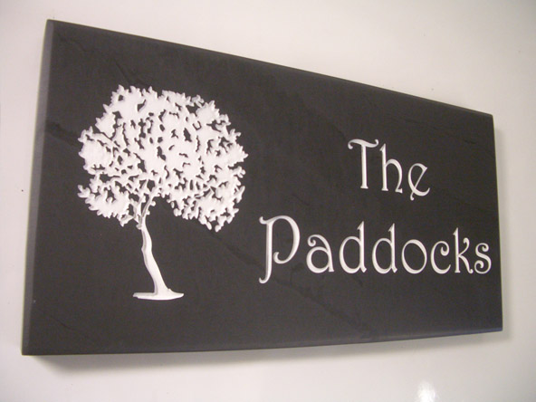 custom house sign with engrave of a tree